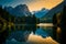 A tranquil, moonlit night over a calm, reflective lake surrounded by dense forest