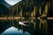 A tranquil mountain lake with a solitary boat moored at a rustic wooden dock,