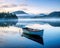 tranquil and mystical scene of a boat on a misty lake at dawn.