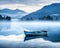 tranquil and mystical scene of a boat on a misty lake at dawn.