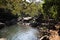 Tranquil pool near Dudhsagar Falls