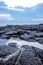 Tranquil rock pool on a rocky shoreline