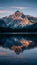 Tranquil scene majestic mountain range reflected in water