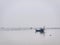 Tranquil Scenery of Fisherman Ship in the Sea