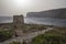 Tranquil scenery of Xlendi Tower in Xlendi Bay in Malta