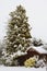 Tranquil snowy scene of a wooden hut covered in snow