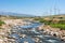 Tranquil and sustainable landscape with wind turbines generating clean, renewable energy