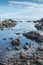 Tranquil tidal pool on a rocky beach in south Africa