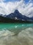 Tranquil Turquoise Waterfowl Lake with Mountain Reflection, Alberta, Canada