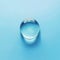 Tranquil water droplet on blue background