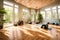 A tranquil yoga studio with bamboo flooring, large windows, and soothing decor for a peaceful practice