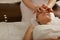 Tranquil young woman with tiny accessories being in relaxed state