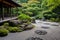 Tranquil Zen garden, featuring meticulously raked gravel, carefully placed rocks, and lush greenery. Generative AI