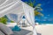 Tranquility beach lounge canopy. Relax carefree scene, towel pillows and beds in sunny tropical weather