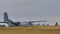 Transall C-160. Distant view of the military aircraft taxiing on the runway.