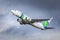 Transavia jet in under dark clouds