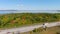 TransCanada highway, Lake of Two Mountains Bridge and fall season colors in the outskirts of Montreal