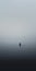 Transcendent Minimalist Photography: A Gondola Lost In A Vast River Of Fog