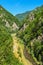 Transfagarasan landscape - river crossing through the mountains - Romania