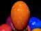 Transformed single yellow orange shining detailed textured easter egg