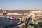 Transhipment terminal for unloading bulk cargo of chemical sulfur from ships using a coastal crane. Port of Zorf-Lasfar, Morocco.