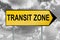 Transit zone traffic sign with black and white cloudy sky