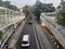 Transjakarta bus stop crossing bridge