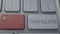 Translate concept on keyboard with Chinese flag. China flag button on keyboard