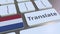 TRANSLATE text and flag of the Netherlands on the buttons on the computer keyboard. Conceptual 3D animation