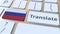 TRANSLATE text and flag of Russia on the buttons on the computer keyboard. Conceptual 3D animation