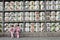 Translation: girls in kimono in front of drums or barrels of sake (Japanese alcoholic drinks) at Tsurugaoka shrine