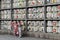 Translation: girls in kimono in front of drums or barrels of sake (Japanese alcoholic drinks) at Tsurugaoka shrine