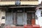 Translation: The rustic doors and wall around Kandy