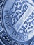 Translation: Turkish lira. Fragment of 1 lira coin close up. National currency of Turkey. Blue tinted vertical illustration for