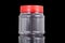 Translucent plastic PVC jar with red cover isolated in black