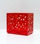 Translucent red plastic box with perforated pattern body