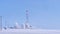 Transmission tower in winter, Telecommunications tower with cellular antenna and satellite dish