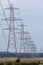 Transmission towers in a long line
