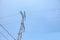 Transmission towers, pylons, power towers, adapted for high voltage electricity transportation and distribution