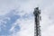 transmitter atop a cell phone pole About to be upgraded from 4g to 5g. High-risk electrical engineer job in Thailand