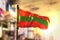 Transnistria Flag Against City Blurred Background At Sunrise Backlight