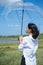 Transparency umbrella and young asian woman under blue sky