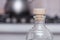 Transparent bottle with wooden cork in the kitchen