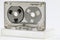 Transparent compact cassette on empty box