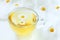 Transparent cup of healthy chamomile herbal tea