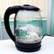 Transparent electric kettle with boiling water inside