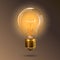 Transparent glowing electric light bulb with a gold base. Realistic style.