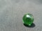 Transparent and green glass Marble