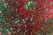 Transparent green and red slime with glittering multicolor particles