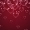 Transparent heart bubbles on maroon background